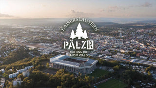 Ein Luftbild einer Stadt mit einem Stadion.