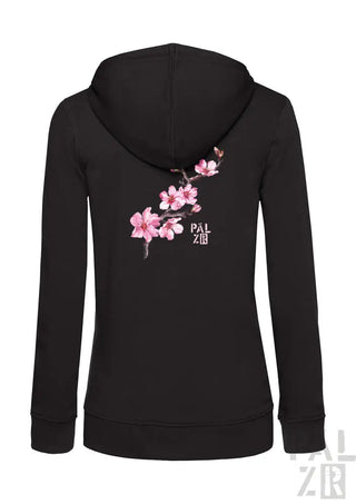 Schwarzes Reißverschluss-Hoodie mit rosa Kirschblüten-Design und ’palzib’ Branding.