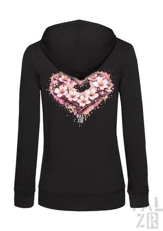 Schwarzes Reißverschluss-Hoodie mit einem lebendigen pinken Kirschblüten-Herz-Design mit Spritzeffekten und dem Markennamen „pall zor“ darunter.
