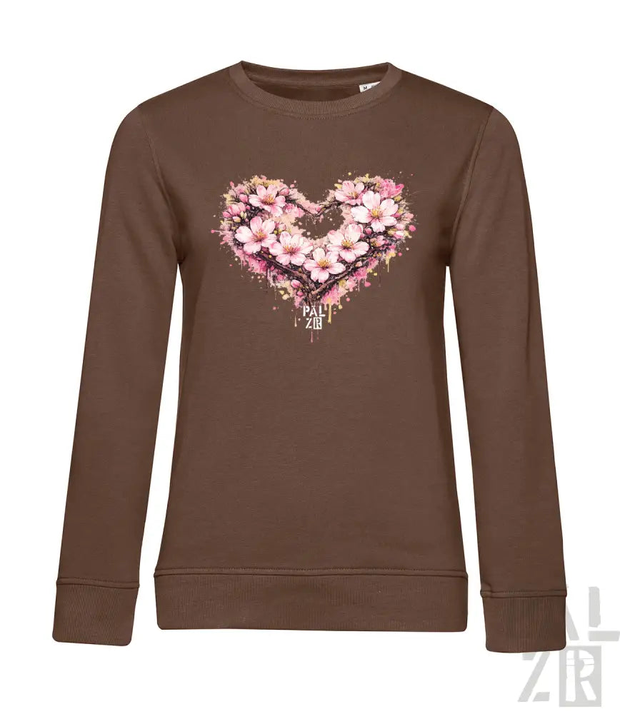 Braunes Langarm-Sweatshirt mit lebendigem herzförmigem Blumenmuster in pinken und weißen Blüten mit Spritzeffekten.
