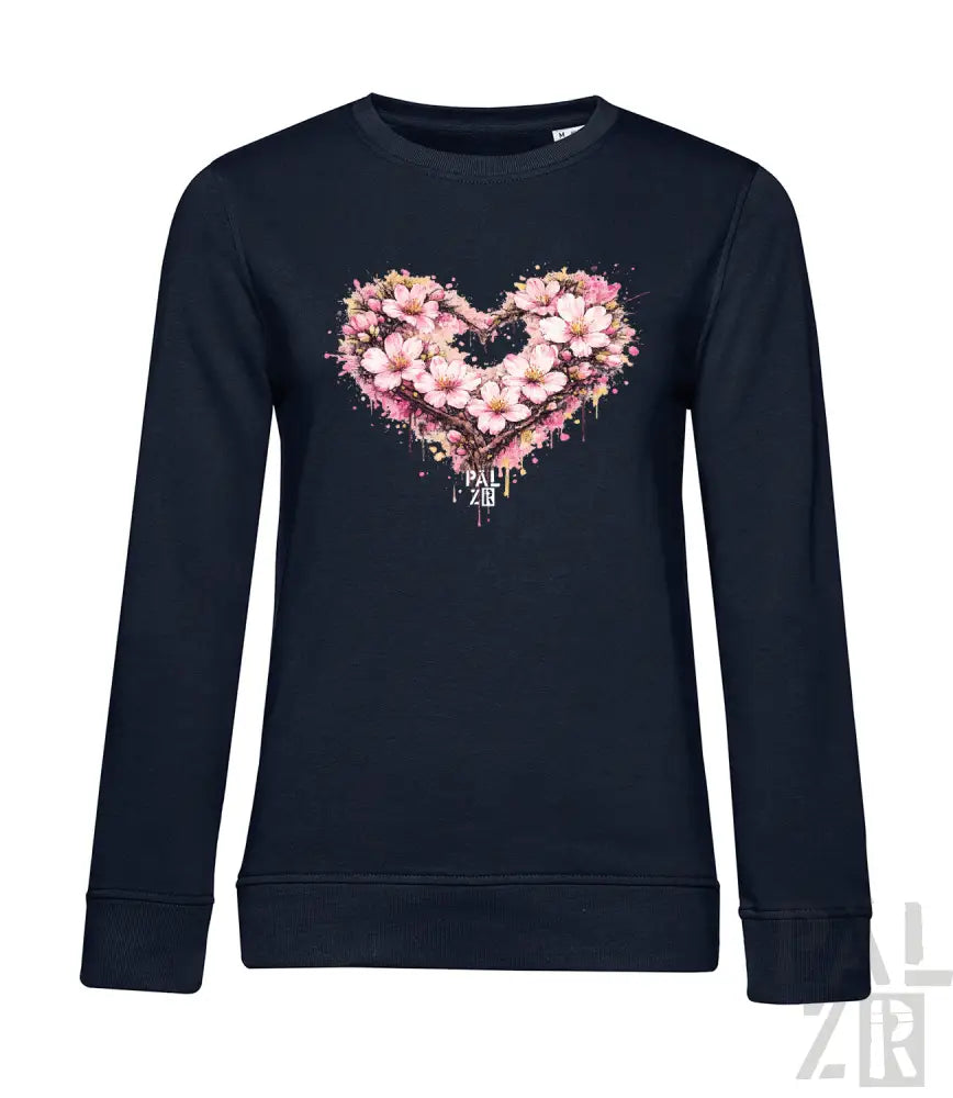 Dunkelblaues langärmliges Sweatshirt mit einem lebendigen pink-weißen floralen Herz-Design mit Spritzeffekten.
