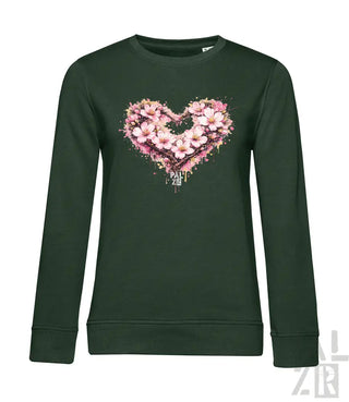 Dunkelgrünes Langarm-Sweatshirt mit einem lebendigen pink-weißen Blumenherz-Design mit Spritzeffekten.