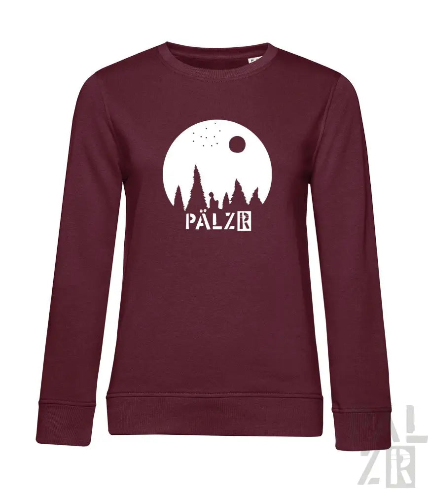Bordeauxfarbene Bio-Baumwoll-Sweatshirt mit ’pälzr’-Design, das eine Silhouette von Bäumen und Vögeln vor dem Mond zeigt.
