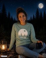Frauen pulli sternegugger in weichem salbeigrün mit weißem kreis und waldmotiv palz schriftzug