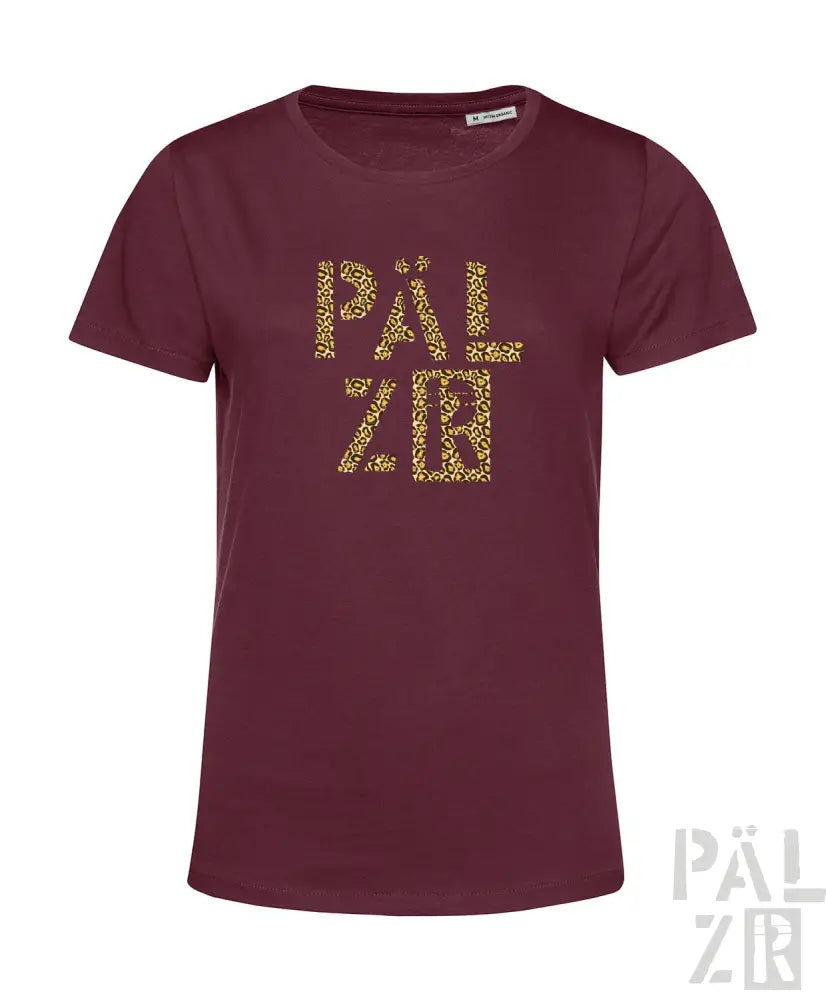 Bordeaux-farbenes kurzärmeliges T-Shirt mit Textdesign ’päl zr’ in goldenen Glitzerbuchstaben.