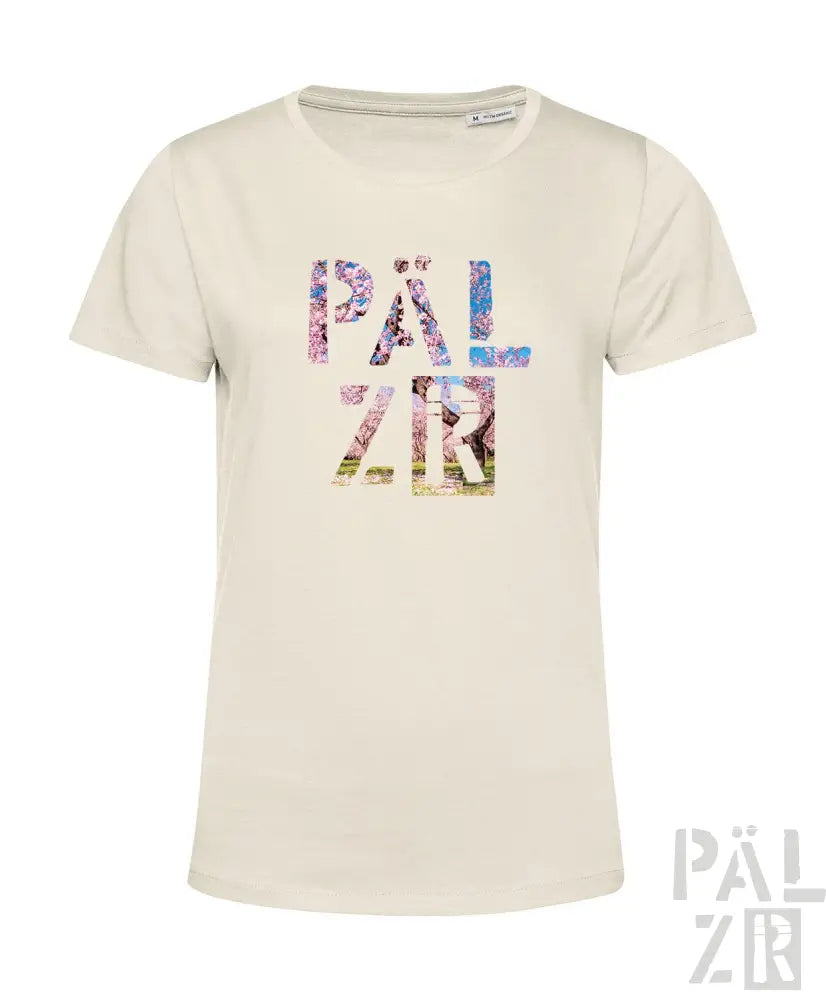 Cremeweiße T-Shirt mit ’pälzr’-Logo in mehrfarbigem Blumenmuster, mit Rundhals und kurzen Ärmeln.