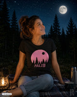 Frauen t-shirt sternegugger schwarz mit pinkem kreisgrafik und pälz schriftzug vor einem baum silhouette
