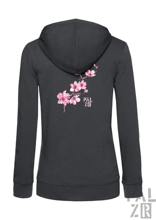 Dunkelgrauer damen zip-up hoodie mit zartem pinkem mandelzweig design auf der rückseite und pal zir branding