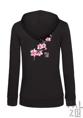 Frauen zipper pälzr schwarzer hoodie mit zartem rosa mandelzweig design auf der rückseite und pal zir branding