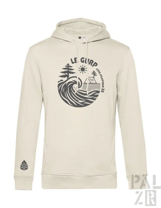 Creme-farbene Hoodie mit schwarzem Grafikdesign, das eine Welle, Bäume und ein Haus zeigt.