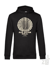 Schwarzer männer hoodie mit cremefarbenem baumringmotiv und text aus gutem holz palzib original bedruckt