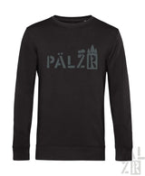 Schwarzer Pullover mit Pelzr mit Burgen-Design auf der Vorderseite.
