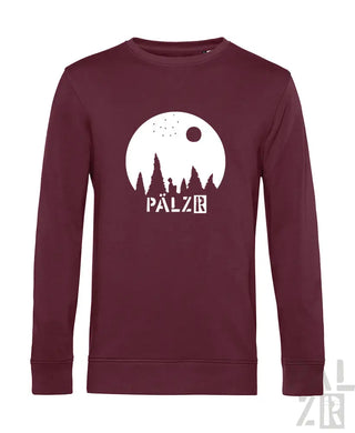 Bordeauxfarbener Sweatshirt mit weißem ’pálzr’-Logo und Silhouette von Bäumen vor einem Mond-Design.