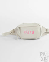 Beige pälzr studio waist bag with pink logo and zipper details in various colors