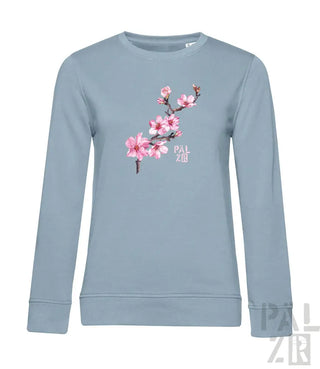 Hellblaues Sweatshirt mit pinkem Kirschblüten-Design und ’palzbr’-Logo.
