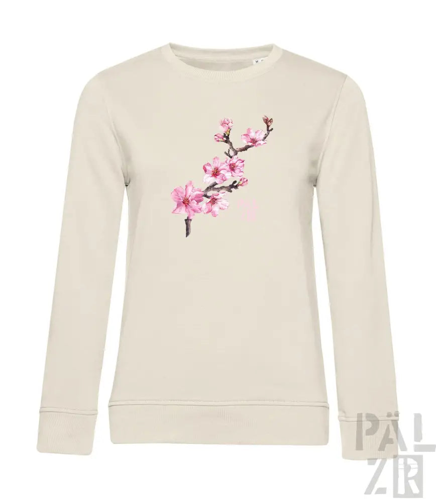 Cremeweißer Pullover mit rosa Kirschblüten-Design, Material aus Bio-Baumwolle.