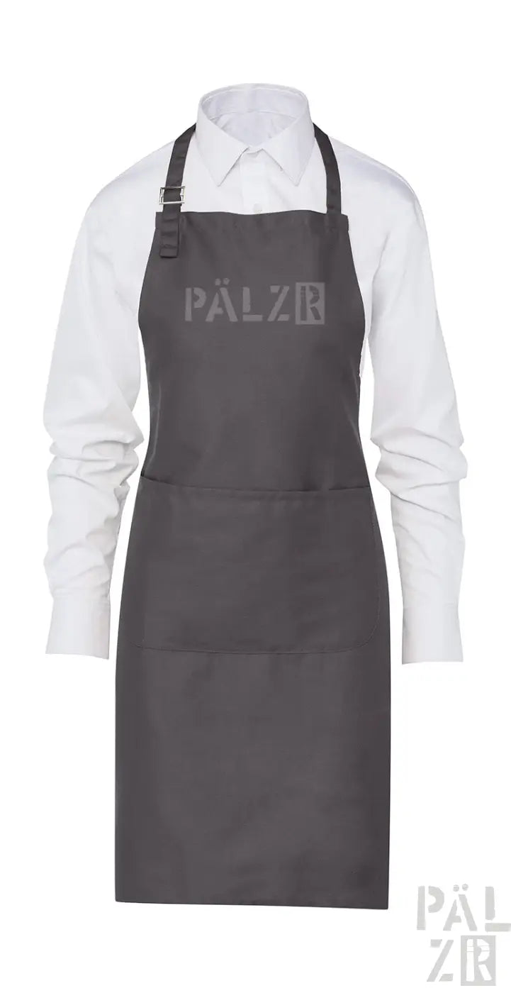 Dunkelgraue Schürze aus Kohle mit verstellbarem Nackenschnur und Vordertasche, mit dem ‚palzr‘-Logo.