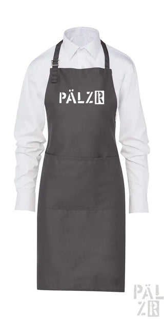 Kohle-Schürze mit weißem ’pälzr’ Logo und verstellbaren Trägern.