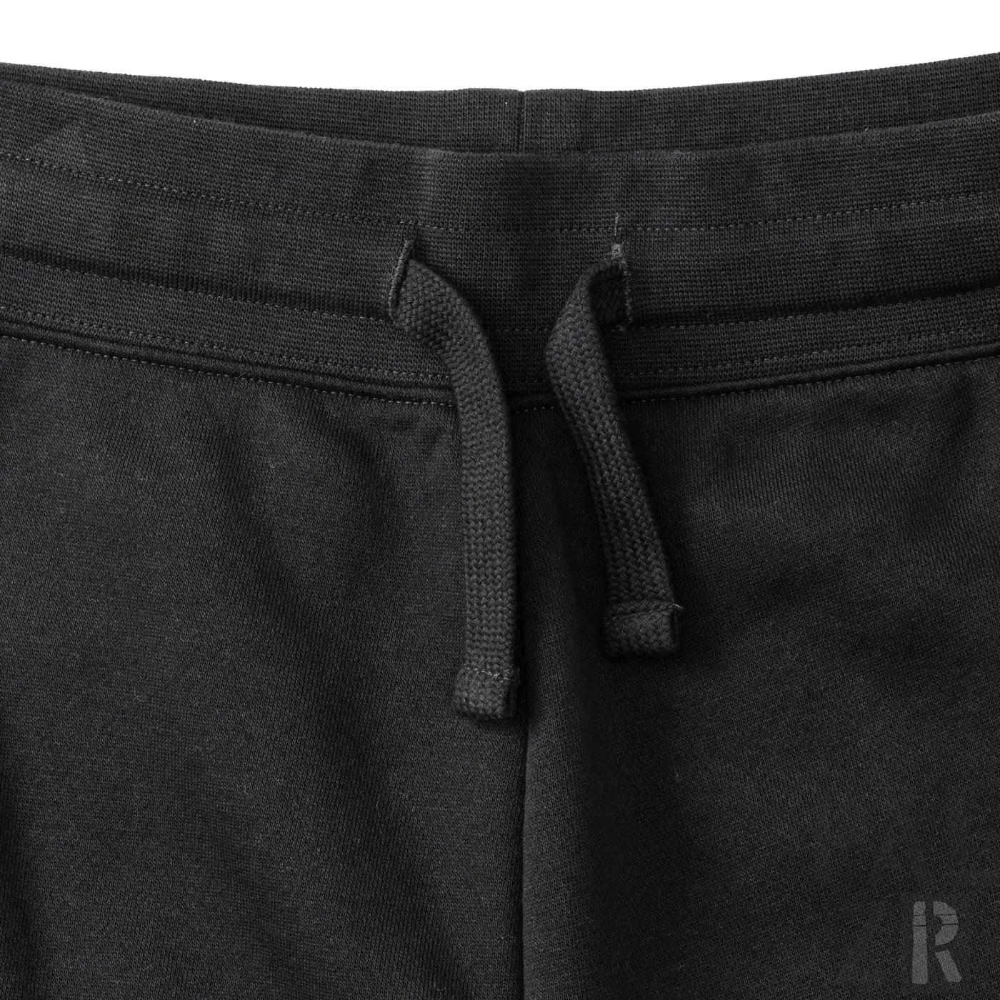 Schwarze Hosen mit Kordelbund, elastischem Material und Markenlogo.