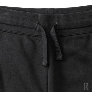 Schwarze Hosen mit Kordelbund, elastischem Material und Markenlogo.