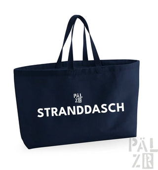 Marineblaue Tragetasche mit weißem Text und Logo, ’stranddasch’ Design.