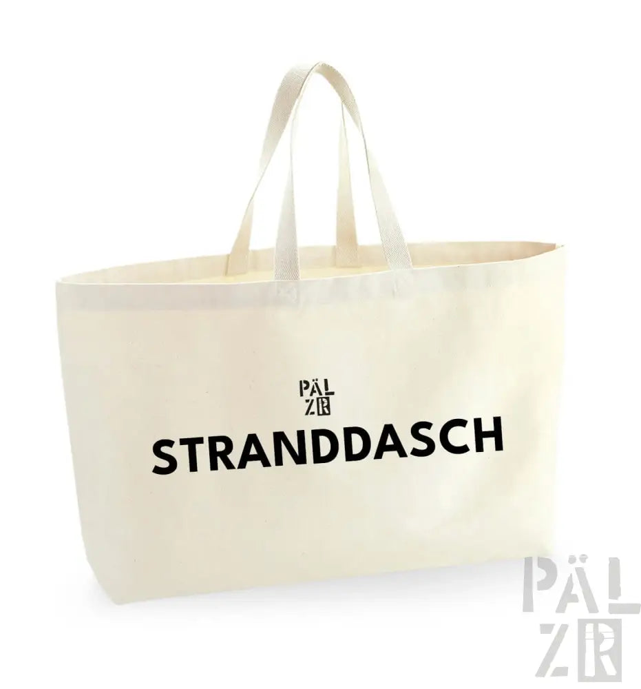 Natürliche Baumwolltasche mit ’stranddasch’-Text und Logo, cremefarben.