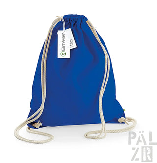 Königsblaue Rucksack mit Kordelzug, weißen Seilgriffen und einem kleinen Etikett.