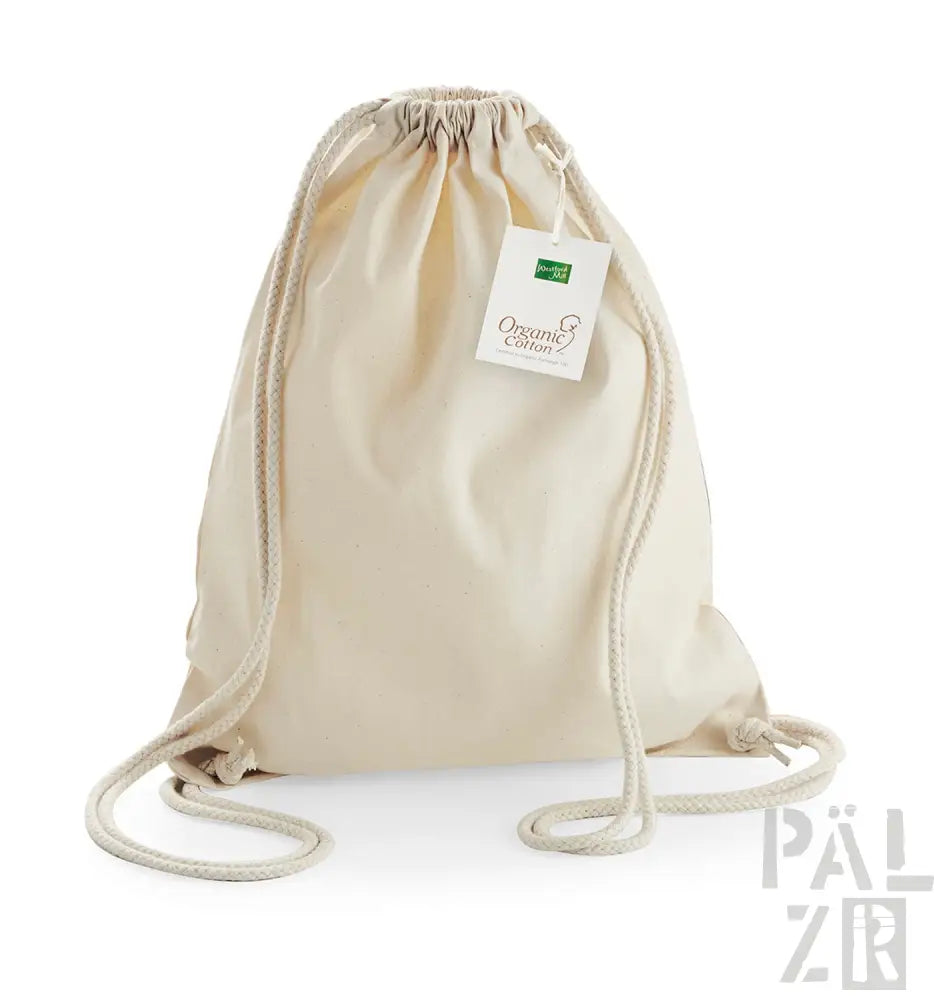 Rucksack aus Bio-Baumwolle mit Kordelzug, natürliche Beige-Farbe mit grünem Etikett und Logo.