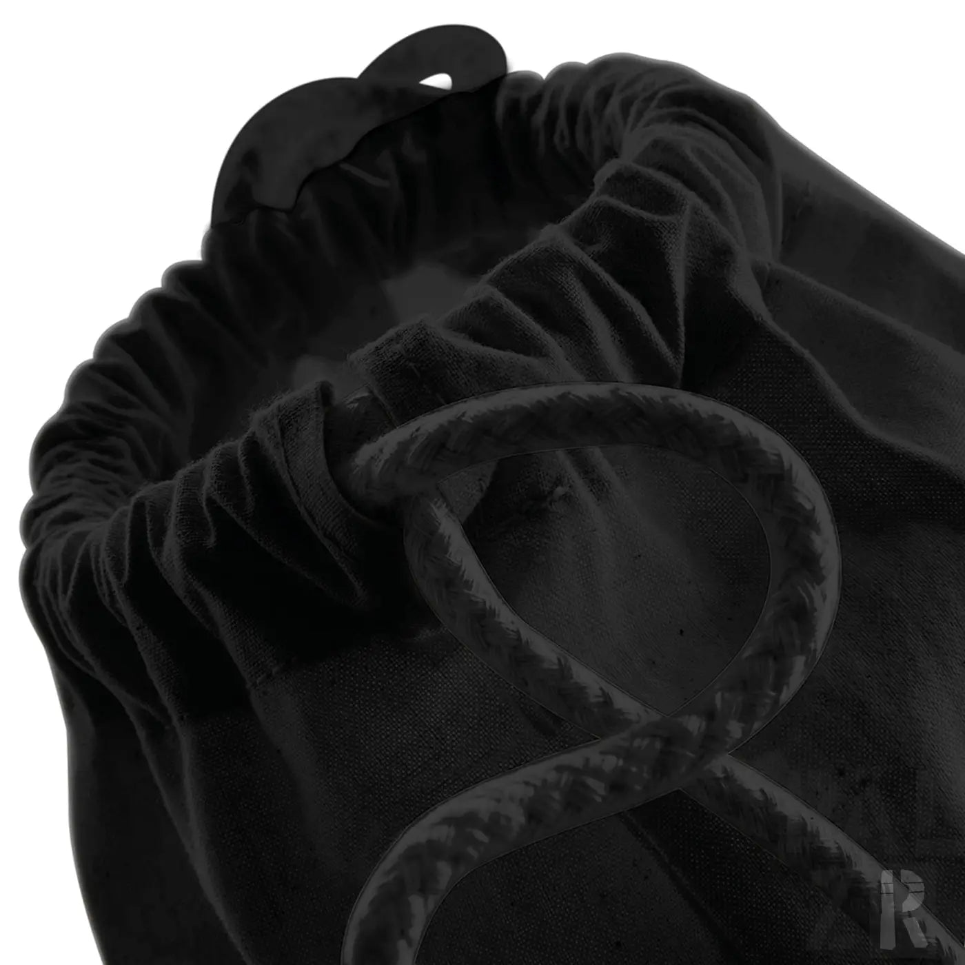 Schwarzer Samt-Beutel mit Kordelzug, texturierter Oberfläche und Schlaufenverschluss.