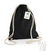 Schwarzer Rucksack mit Kordelzug, weißen Seilgriffen und einem grünen Etikett.