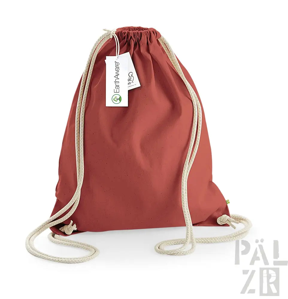 Marsala Rucksack mit Kordelzug, weißen Seilgriffen und Etiketten, aus Nylonmaterial gefertigt.
