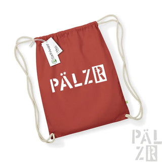 Roter Rucksack mit Kordelzug und weißem ’pälzr’-Logo und -Etikett.