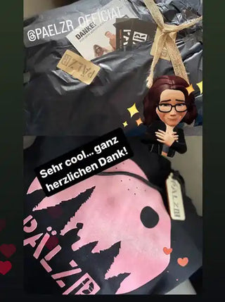 Schwarzer Hoodie mit pinkem Grafikdesign.