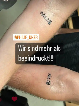 Zwei Unterarme mit passenden 'PÄLZER'-Tattoo's.